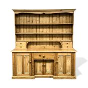 LARGE VICTORIAN PINE KITCHEN DRESSER, boarded plate rack back, having three shelves over open