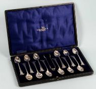 CASED SET OF TWELVE GEORGE V SILVER TEASPOONS & SUGAR TONGS, Onslow pattern, Walker & Hall,