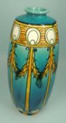 MINTONS SECESSIONIST VASE, pattern no. 1, finished in a blue and yellow glaze, printed mark,