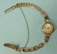 ROTARY 9CT GOLD LADIES' BRACELET WRISTWATCH (currently ticking when wound), 13mms dial, gross weight