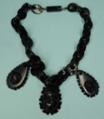 VICTORIAN WHITBY JET NECKLACE, with three pendant drops (repair to the clasp), 46cms (l) Provenance:
