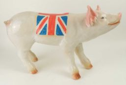 DECORATIVE BUTCHER'S SHOP ADVERTISING POTTERY PIG, back adorned with the Union flag, 53cms (l)