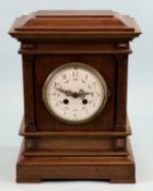 WALNUT CASED MANTEL CLOCK, circular enamel dial painted with floral swags, black Arabic numerals and