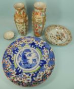 PAIR OF CANTON FAMILLE ROSE VASES, late 19th century (with damages and repairs), 25 and 26.5cms (h);