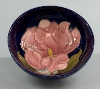 MOORCROFT CIRCULAR FOOTED BOWL, pink magnolia on cobalt blue ground, impressed marks to base, 6.5 (
