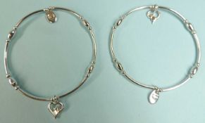 TWO CLOGAU STERLING SILVER BRACELETS, one in original box (2) Provenance: private collection