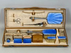 GEORGE V VANITY SET, two hairbrushes, hand mirror, and glass bottles with silver and blue