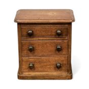 VICTORIAN MAHOGANY TABLETOP CHEST of three graduated drawers with turned knob handles, 28.5 (h) x 25