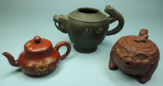 CHINESE YIXING TEAPOT, carved with peony, signed, 8cms (h); together with a Yixing style teapot,