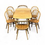 ERCOL LIGHT ELM DROP-LEAF TABLE & STICK BACK CHAIRS, table 71 (h) x 138 (l) x 78cms (w); two