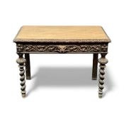 GOTHIC STYLE OAK DESK, carved rim and drawer with mask head handle, spiral turned and carved
