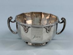 GEORGE V SILVER TWO-HANDLED TWELVE-SIDED FOOTED BOWL, Goldsmiths & Silversmiths Co., London 1927,
