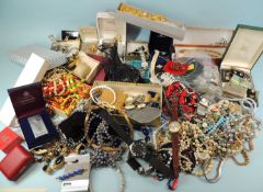 LARGE QUANTITY OF ASSORTED COSTUME JEWELLERY, including fashion watches, beaded necklaces, brooches,