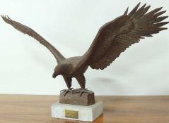 R WHITMORE (20th CENTURY), DECORATIVE BRAZED METAL SCULPTURE OF A GOLDEN EAGLE with spread wings, on