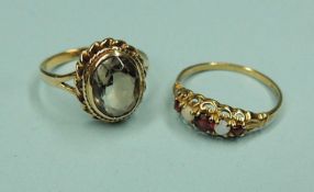 GARNET & OPAL FIVE-STONE RING in 9ct gold, size N; together with smoky quartz dress ring in 9ct