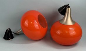 PAIR OF 1970s ORANGE GLASS CEILING LIGHTS, 32 (h) (without the cord) x 27cms (diam.) Provenance: The