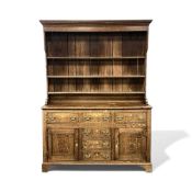 19TH CENTURY OAK WELSH DRESSER, boarded plate rack back having three shelves, base with four