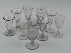 COLLECTION OF DRINKING GLASSES, 18th century and later, including a wrythen fluted ale glass,