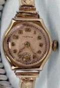 VERTEX VINTAGE 9CT GOLD CASED LADIES' WRISTWATCH, mechanical movement, on plated expanding