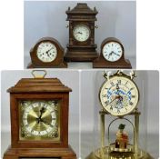 VARIOUS MANTEL CLOCKS, including Oktoberfest anniversary style clock under glass dome, 30cms (h);