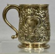 GEORGE III SILVER TANKARD, ornately embossed with scrolls and flowers, with plain loop handle,