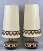 PAIR OF MID-CENTURY STUDIO POTTERY TABLE LAMPS, pierced decoration with textured fabric shades,
