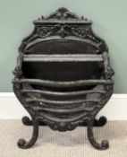 CAST IRON FIRE GRATE with raised back and scrolled frontal supports, 67 (h) x 49 (w) x 26cms (d)