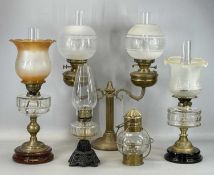 FIVE OIL LAMPS, comprising twin branch with etched globular glass shades, 39cms (h) to fitting;