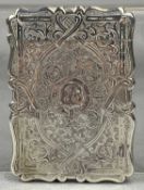 VICTORIAN SILVER CARD CASE of shaped rectangular form, chased foliate decoration, hinged cover,