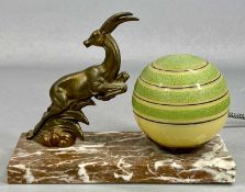 ART DECO TABLE LAMP featuring a bronzed spelter figure of a leaping gazelle with globular opaque