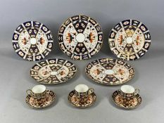 ROYAL CROWN DERBY, IMARI 2451 plates and coffee cans, eleven pieces in total Provenance: private
