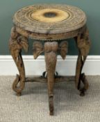EASTERN CARVED CIRCULAR OCCASIONAL TABLE, elephant head supports with bone tusks, 58 (h) x 46cms (