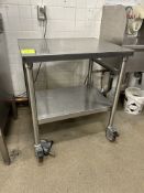 30IN X 24IN X 35IN STAINLESS STEEL TABLE ON CASTERS