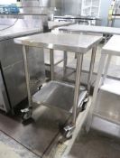 stainless table w/ undershelf, on casters