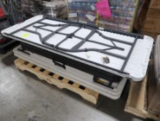 pallet of plastic top folding tables
