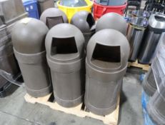 pallet of torpedo trash cans