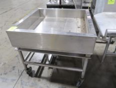 stainless iced product merchandiser, anglable
