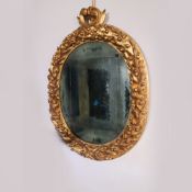 ♢ Gilded wood oval mirror Italy, 20th century