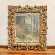 ♢ Golden and patinated wooden mirror Italy, 20th century