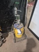 Pneumatic Grease Dispensing Pump, with trolley and part tub of grease auction 23.7.25 Please read