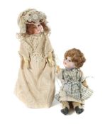 2 kl. Puppen um 1900/1920,