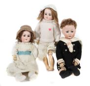 3 Puppen je m. Porzellan-Kurbelkopf,