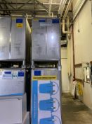 Two Stainless Steel Liquid Totes