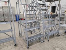 lot of 2 step ladders