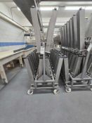 Cheese Molds On Rolling Rack