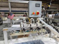 4 Headed Volumetric Bottle Filling Station