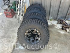 Qty of 4 14in. Side by Side Wheels & Tires