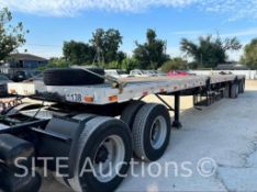 2002 Reinke T/A Spread Axle Flatbed Trailer