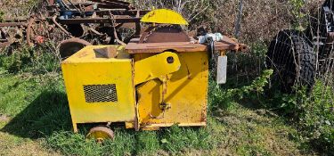 A yellow electric table saw, untested