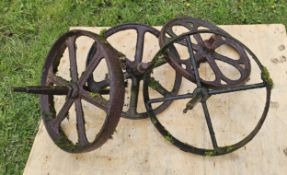 Four cast iron barrow wheels